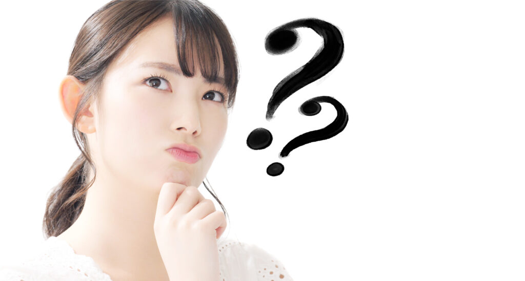 クエスチョンマークと女の人の画像